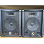 A pair of Kustom KSC10 PA speakers.