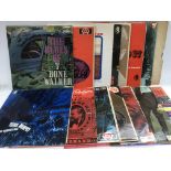 A collection of jazz LPs comprising various artists including T Bone Walker, Turk Murphy, Red