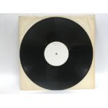 A white label test pressing for Arthur Brown's Kingdom Come LP. Stampers in run out groove 2310254 A