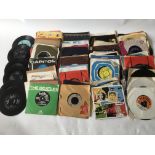 A collection of 7inch singles and EPs by various artists including The Beatles, Otis Redding,
