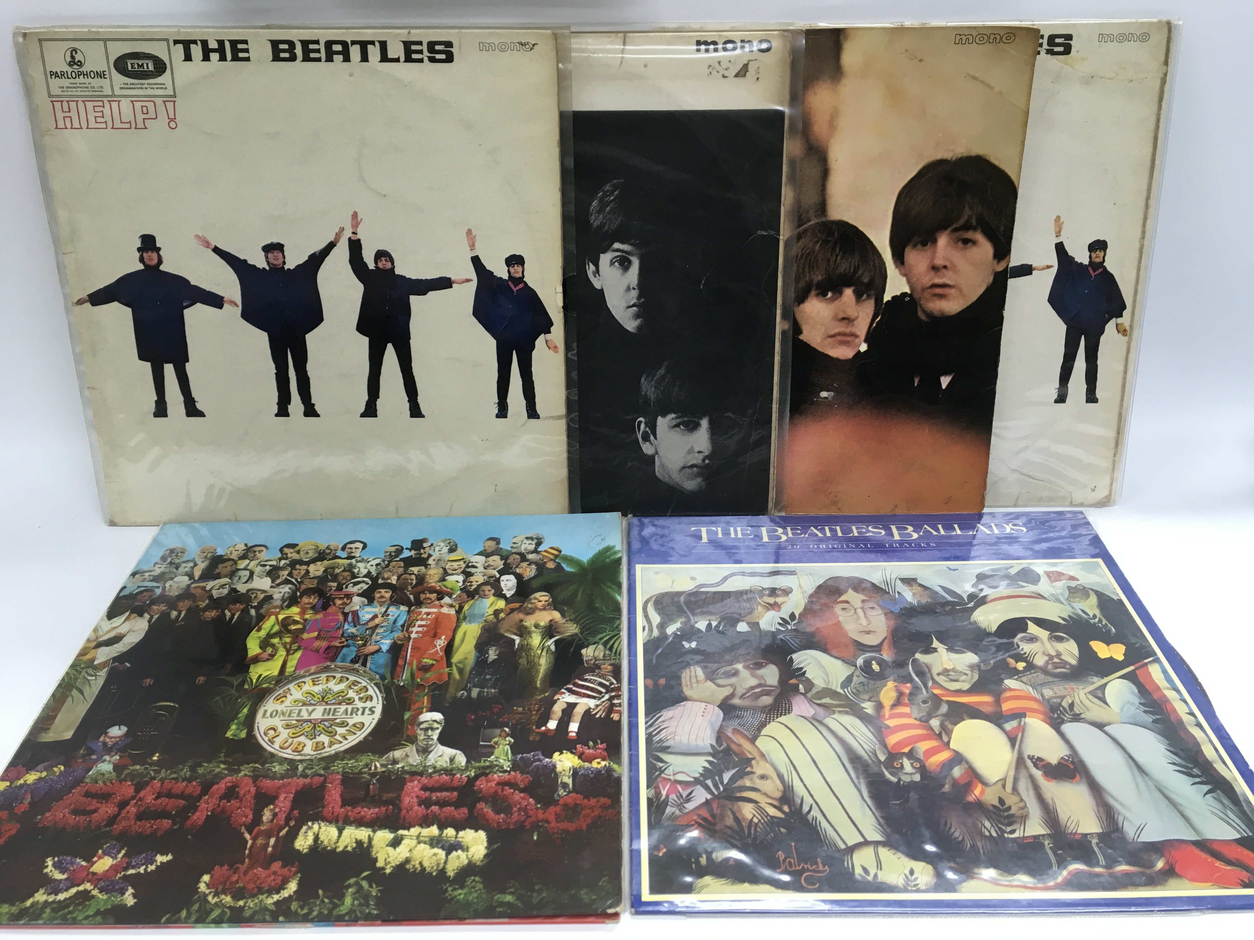 Six early issue Beatles LPs including 'Sgt Pepper's', 'With The Beatles', 'Help!' and others.