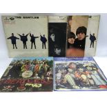 Six early issue Beatles LPs including 'Sgt Pepper's', 'With The Beatles', 'Help!' and others.