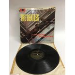 The Beatles debut LP 'Please Please Me' on black and gold Parlophone labels and in Mono. Possibly