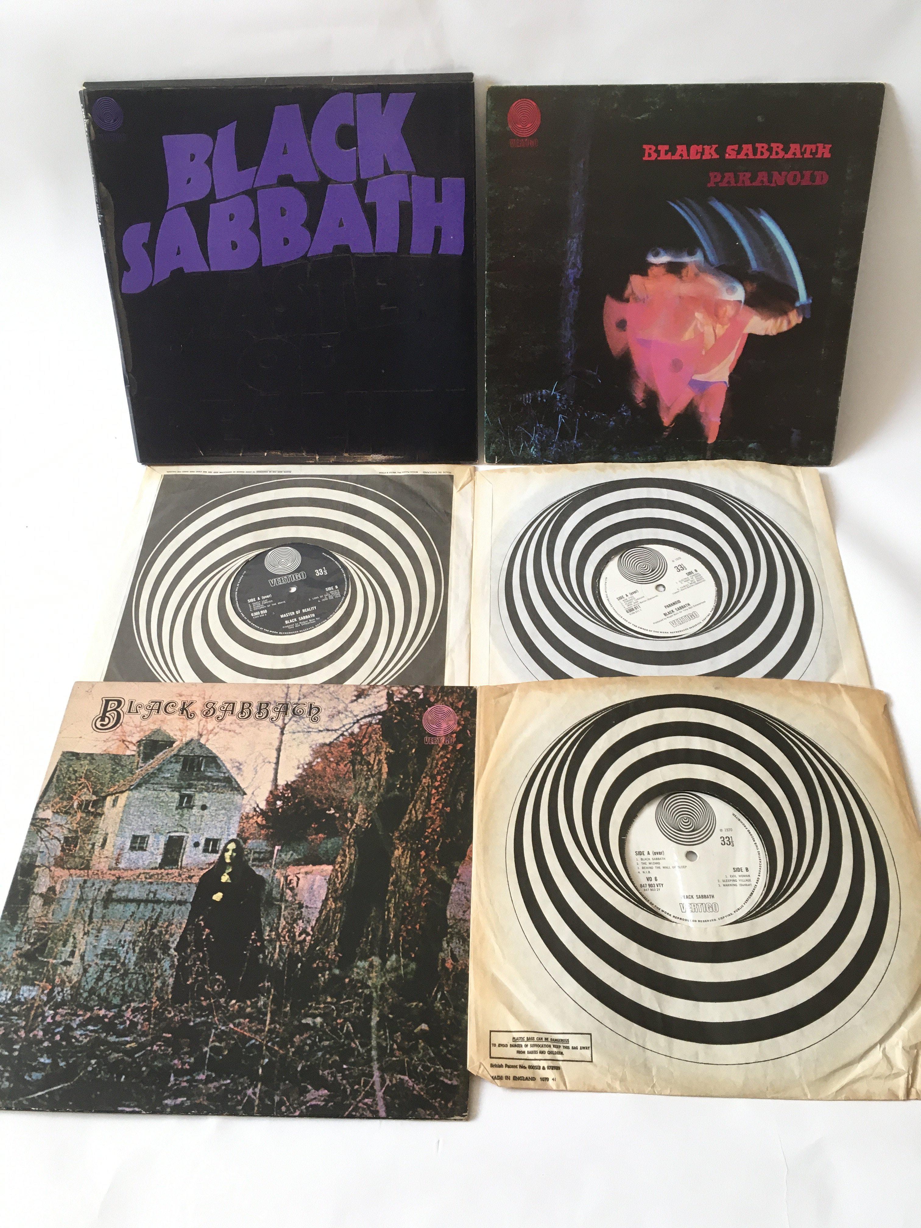 Three early UK pressings of Black Sabbath LPs comprising the self titled debut, 'Paranoid' and '