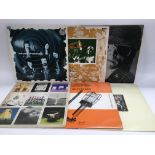 Six LPs by various artists including Pink Floyd, Caravan, Billy Bragg, Lou Reed and Paul Simon.