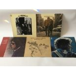 Five Bob Dylan LPs including a reissue of 'Freewheelin', 'Blood On The Tracks', 'John Wesley