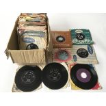 A collection of 7inch singles by various artists including Elvis Presley, Jason Deane, Horell