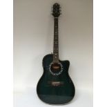 A Crafter bowl back semi acoustic guitar with a green burst top, model FSG 250E.