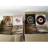 Two boxes of 7inch singles by various artists from the 1960s onwards.