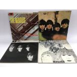Four early issues of Beatles LPs including 'Please Please Me' (not black and gold label), 'With