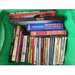 Two boxes of TV, film and sport related annuals and books.