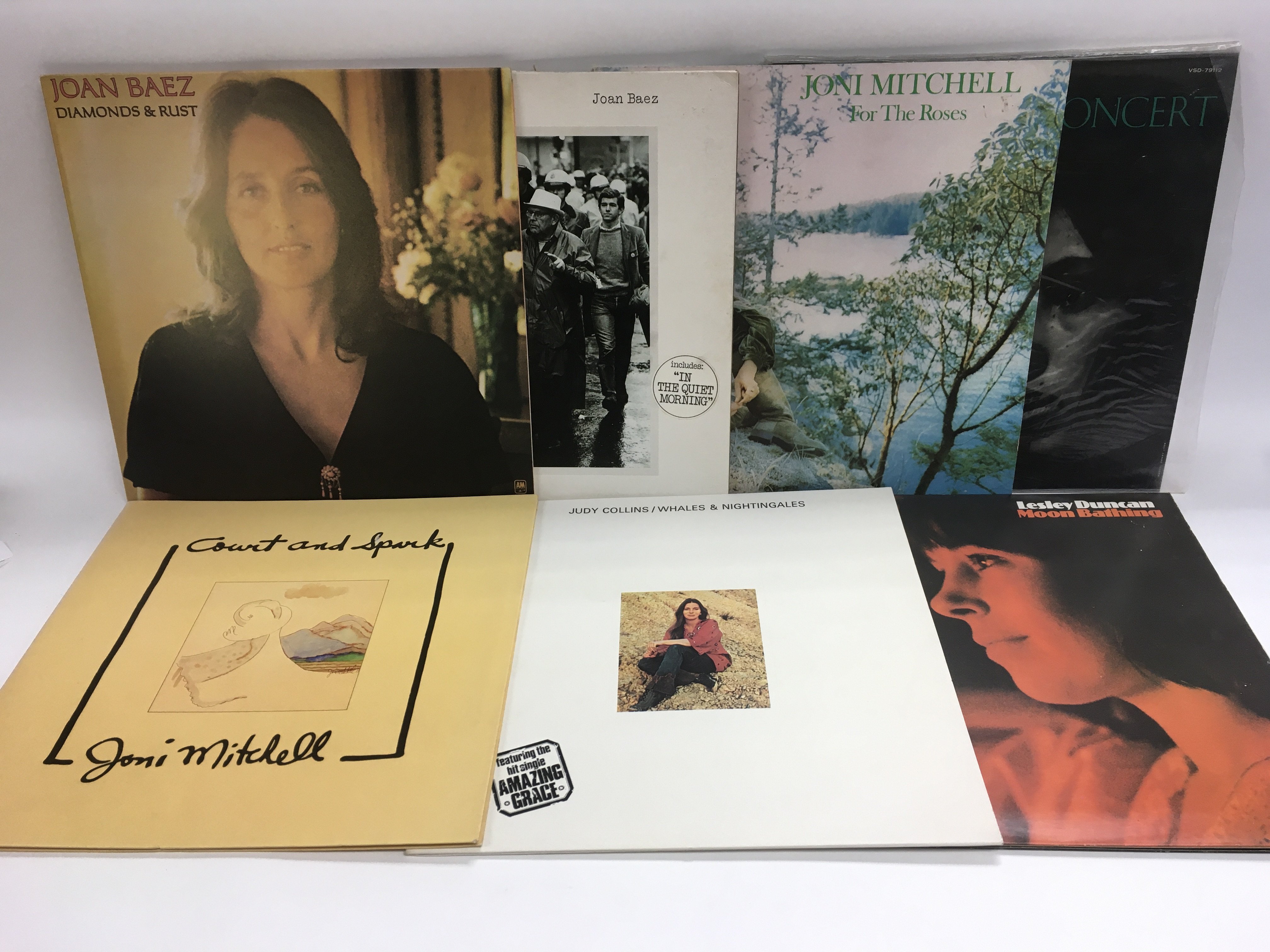 A collection of female folk and singer songwriter LPs by various artists including Joni Mitchell,
