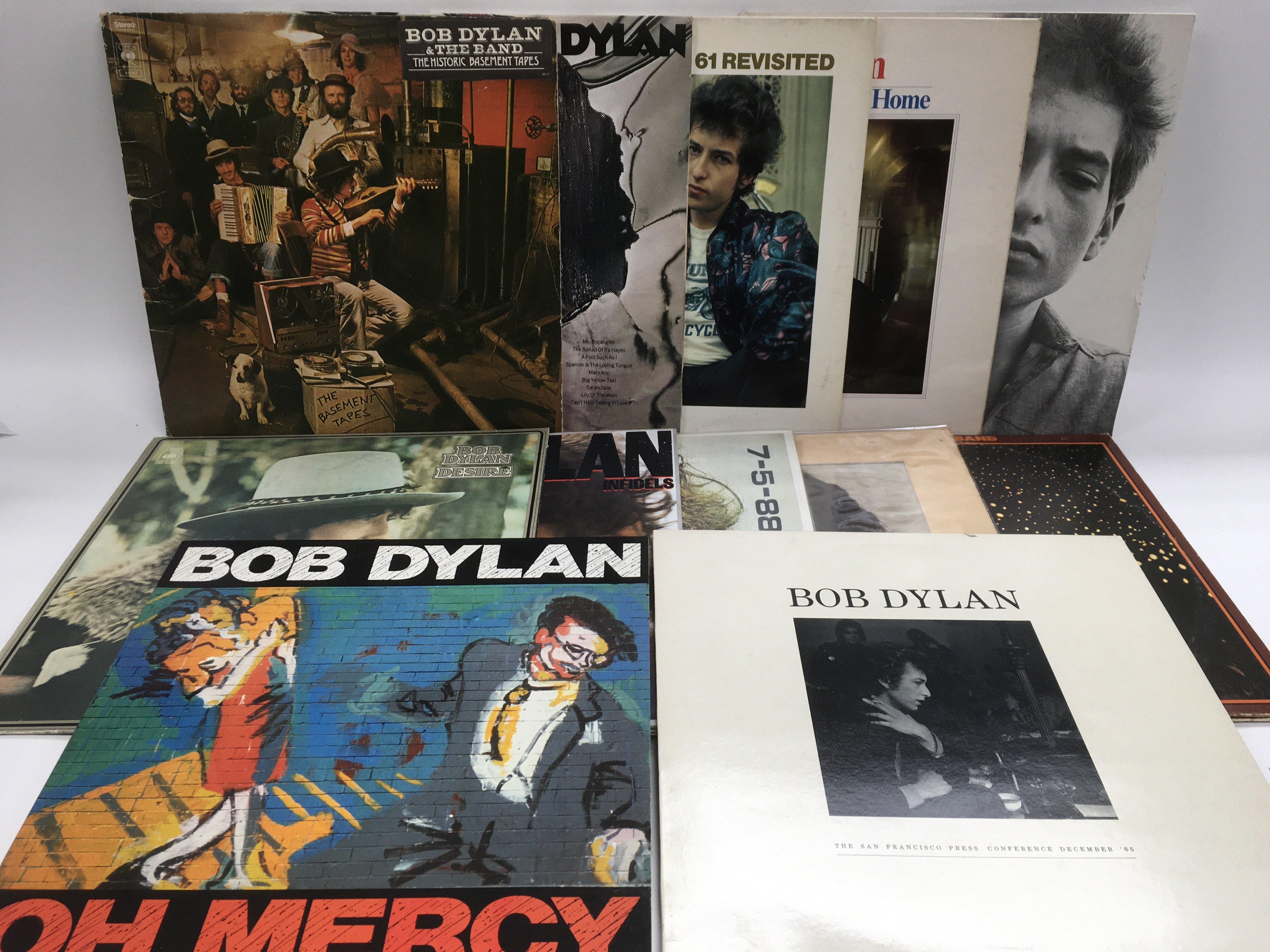 A collection of 24 Bob Dylan and related LPs including 'Highway 61 Revisited', 'Desire', 'The