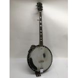 A Lorenzo five string banjo with hard carry case, two straps and spare strings.