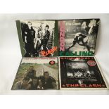 Four LPs by The Clash comprising 'London Calling', the self titled debut album, 'Combat Rock' and '