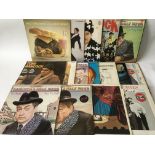 A collection of comedy LPs.