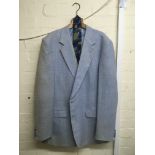 A Barry Humphries stunt double stage worn powder blue suit with blue and green necktie. The suit was