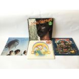 Four psychedelic rock LPs including 'Joe's Garage Acts. 1-3' by Frank Zappa, '13' by The Doors,