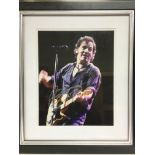 A framed and glazed signed photo display of Bruce Springsteen, approx 47cm x 54cm.