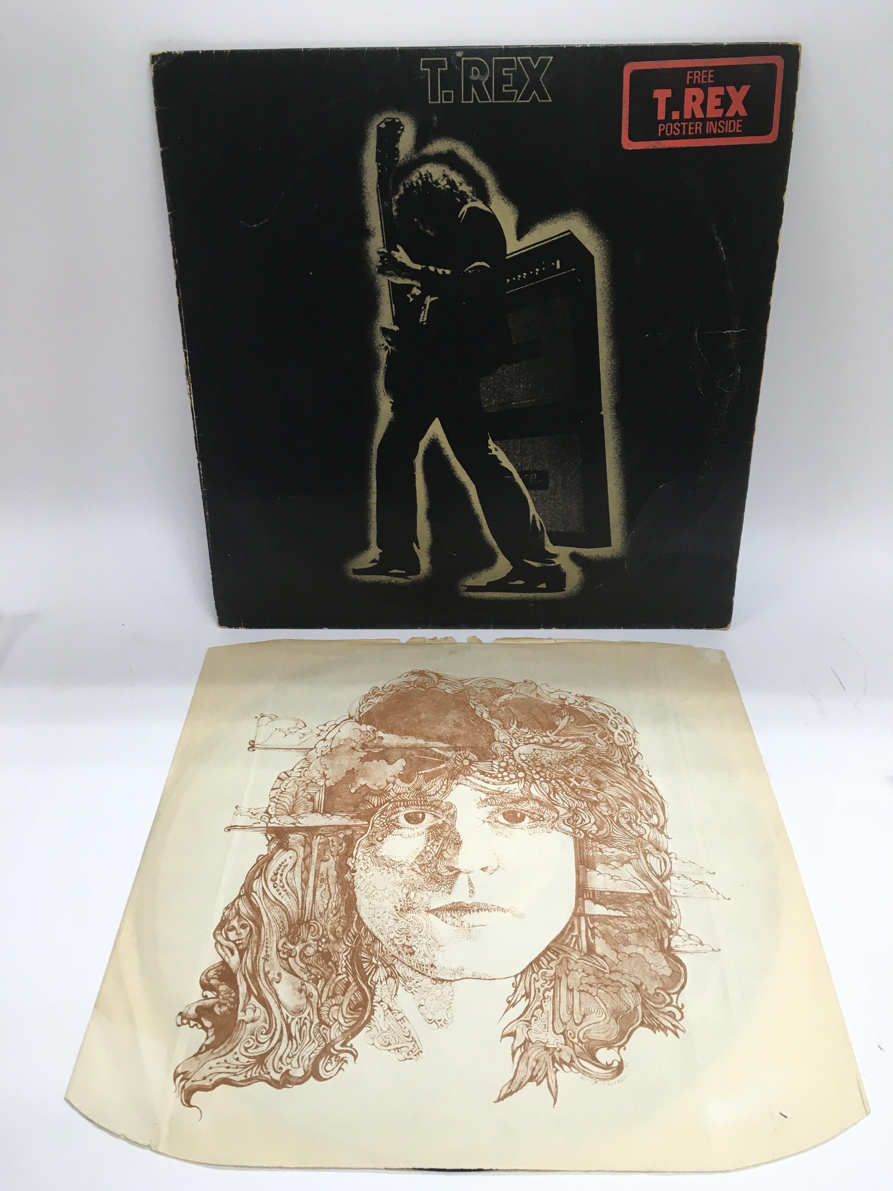 A rare 1971 UK issue of 'Electric Warrior' by T Rex (no poster). Sleeve fair, record fair.