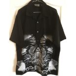 An original Rolling Stones 'Tattoo You' short sleeve shirt in black by Dragonfly Clothing Company,