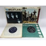 A 'Meet The Beatles' compact mini 7 inch six track LP, a Dave Clark Five 'Wild Weekend' EP,