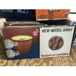 A collection of indie and rock LPs by various artists including New Model Army, Lush, Skid Row and