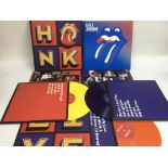 A Rolling Stones 4LP coloured vinyl set of 'Honk' plus a 180g 2LP set of 'Blue & Lonesome'. Conditio