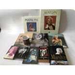 A collection of Marilyn Monroe items.