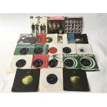 A collection of Beatles and related EPs and 7inch singles.