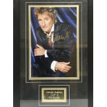 A framed and glazed signed photo display of Rod Stewart, approx 35cm x 55cm.