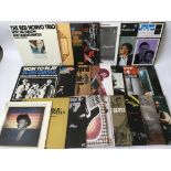 A collection of mainly blues and jazz LPs by various artists including Charles Mingus, Charlie