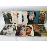Thirteen rock n roll LPs by Elvis Presley, Buddy Holly and The Everly Brothers.