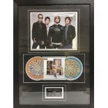 A framed and glazed multi signed photo and CD display of Oasis, signed by Liam and Noel Gallagher,