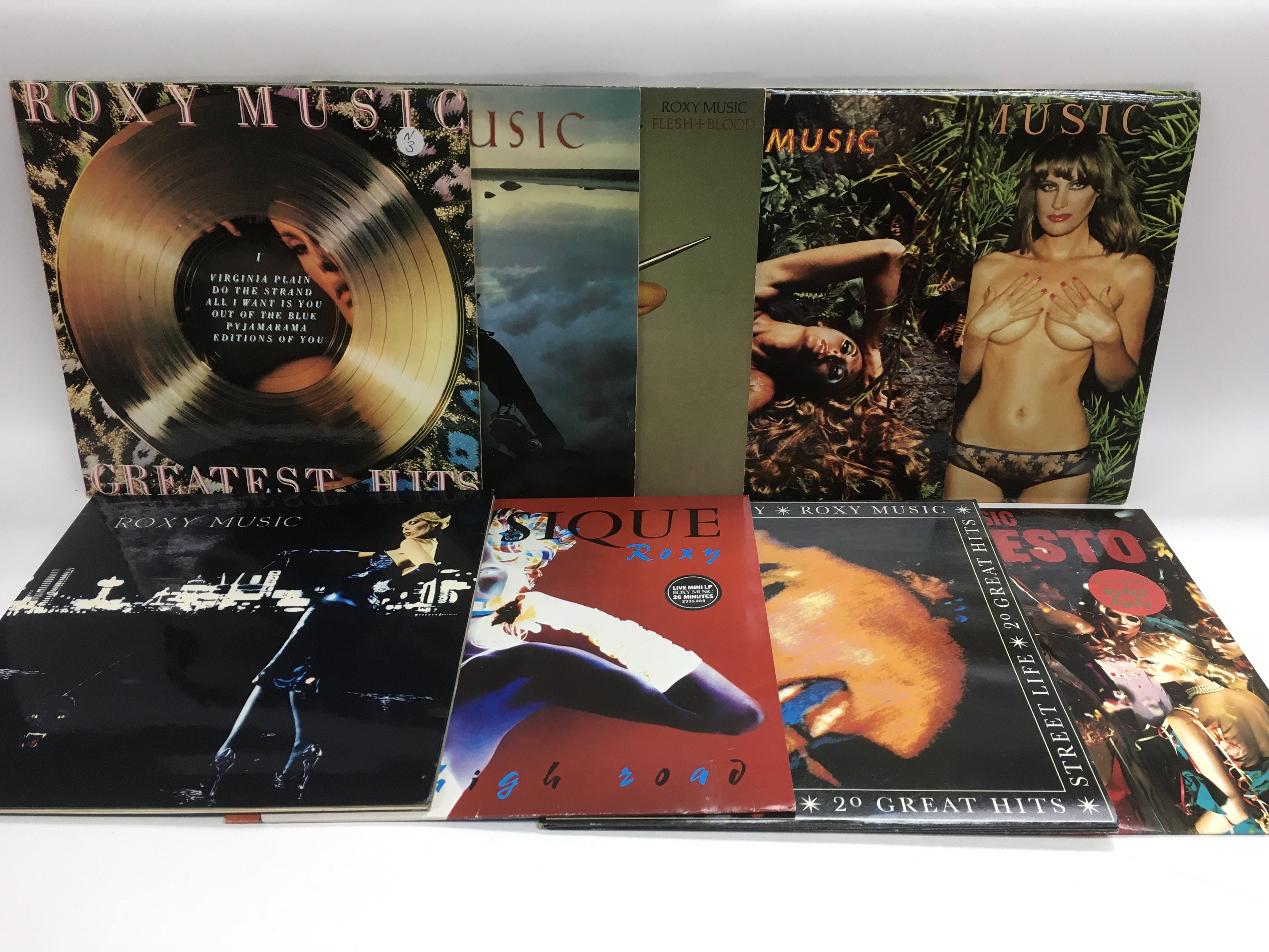 Nine Roxy Music LPs including 'Country Life', 'Stranded', 'For Your Pleasure' and others.