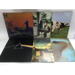 A collection of Pink Floyd LPs including 'Dark Side Of The Moon' including both posters and