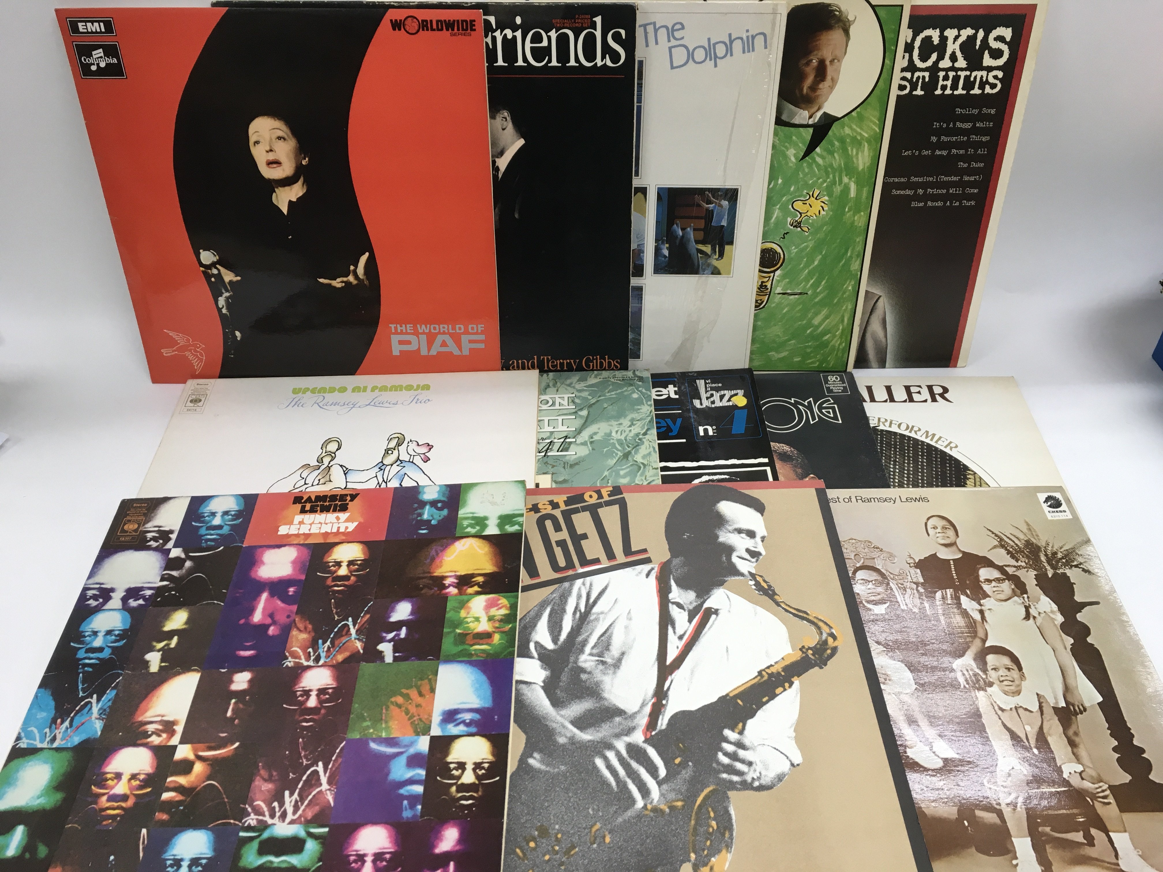 A collection of jazz LPs by various artists including Ramsey Lewis, Stan Getz, Sidnet Bechet and