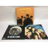 Three Rolling Stones LPs comprising 'On Air' a 2LP set on 180g vinyl plus reissues of 'Hight Tide