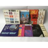Nine LPs by rock n roll and skiffle artists including Buddy Holly, Elvis Presley, Lonnie Donegan and