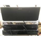 A Samsung BD P1400 BluRay player, a Ferguson DVD recorder, Samsung DVD player and a Sony SS CN10