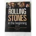 A collectable hardback book on The Rolling Stones 'In The Beginning' by Bent Rej.