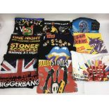 A collection of Rolling Stones tour t shirts, various sizes and some still bagged plus promotional