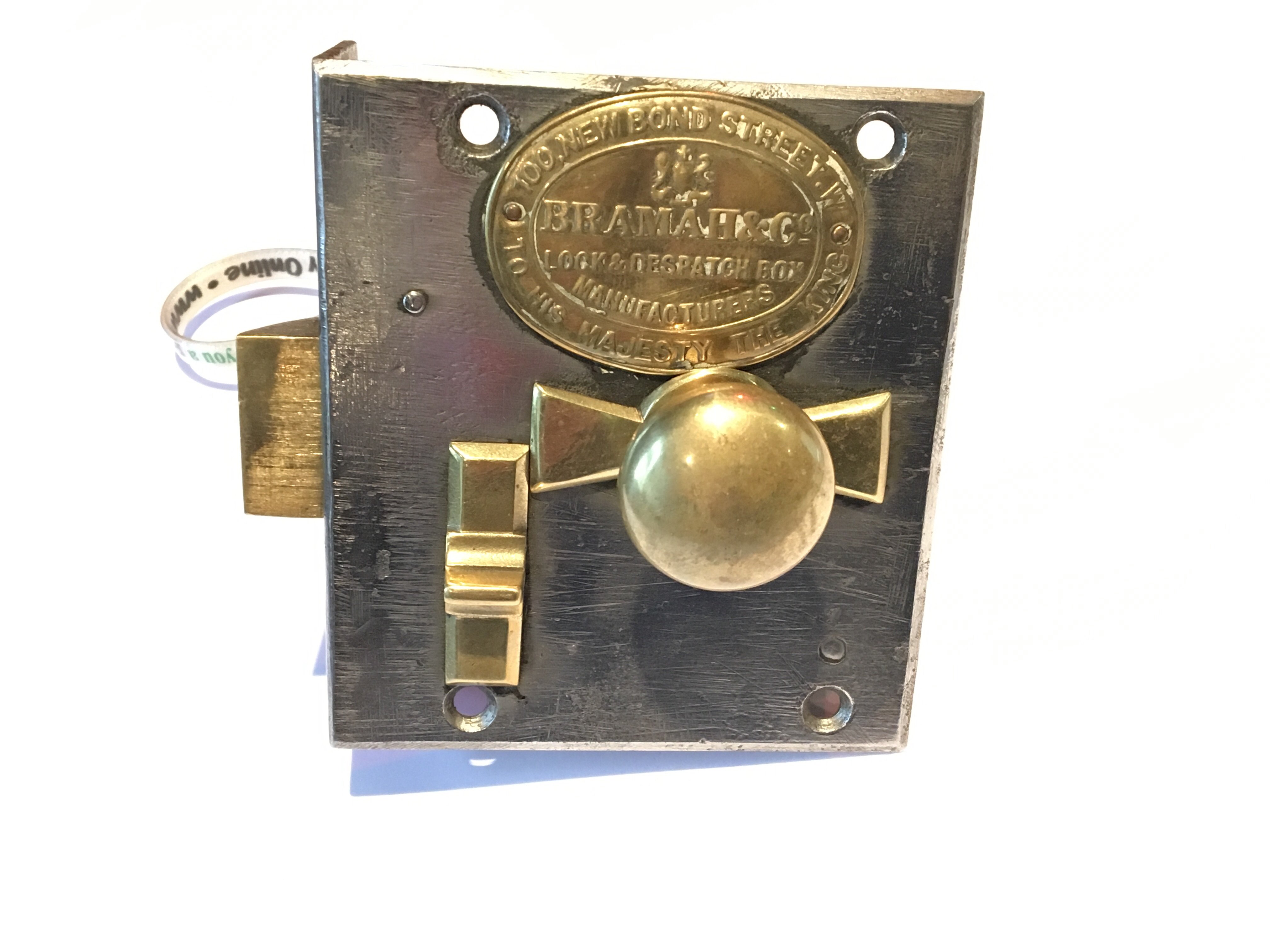 A Bramah&Co lock brass and steel night latch with key applied Royal patent crest to his majesty.