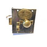 A Bramah&Co lock brass and steel night latch with key applied Royal patent crest to his majesty.