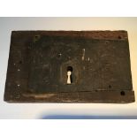 A Steel and Wood 19th Century lock no key. 25x15cm