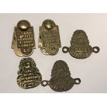 Five brass safe key escutcheons with key covers. (5)