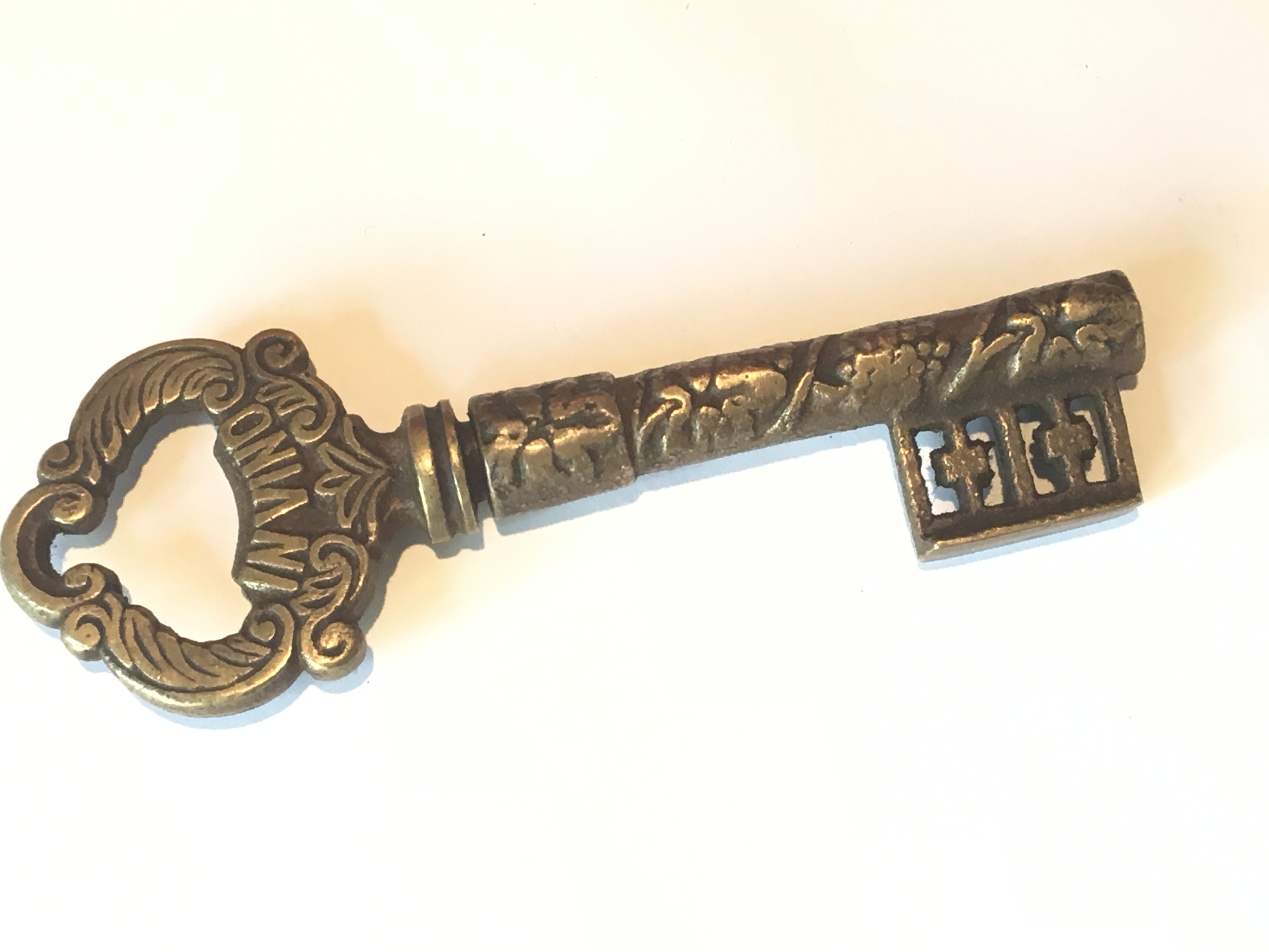 A Novelty brass Victorian butlers key with retractable knife, bottle opener. 13.5cm long. - Image 2 of 2