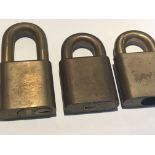 Three Assa bronze padlocks with removable lock core no keys.