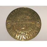 A circular cast brass antique lock and safe makers plaque Phillips & Son Birmingham. Diameter 15cm