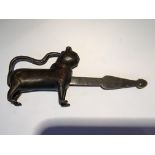 An Antique bronze Chinese casket lock in the form of a Lion or temple dog with locking tail.